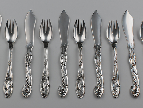 An Art Nouveau 800 grade silver fish cutlery